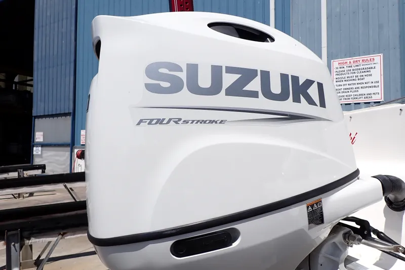 Slide: The Image of Suzuki four-stroke outboard motor on 2021 Hurricane SunDeck Sport 185 OB boat. - 50