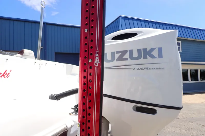 Slide: The Image of 2021 Hurricane SunDeck Sport 185 OB with Suzuki four-stroke engine and red Blade pole. - 59