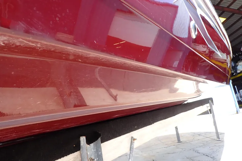Slide: The Image of 2021 Hurricane SunDeck Sport 185 OB boat hull in a storage facility. - 63
