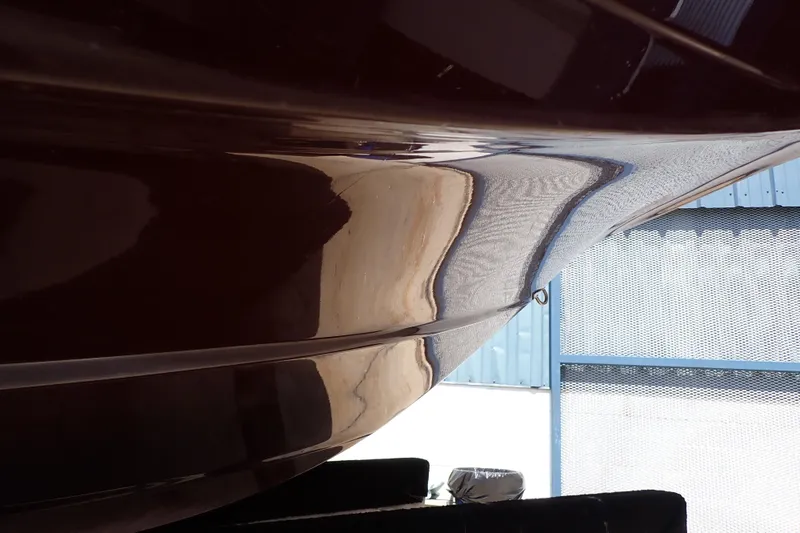Slide: The Image of Close-up of 2021 Hurricane SunDeck Sport 185 OB boat hull in sunlight. - 65