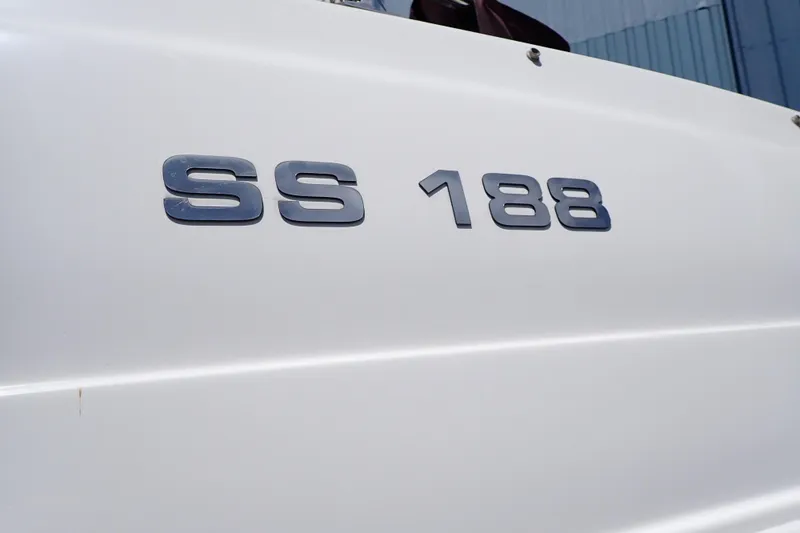 Slide: The Image of Close-up of "SS 188" emblem on a 2021 Hurricane SunDeck Sport 185 OB boat. - 71