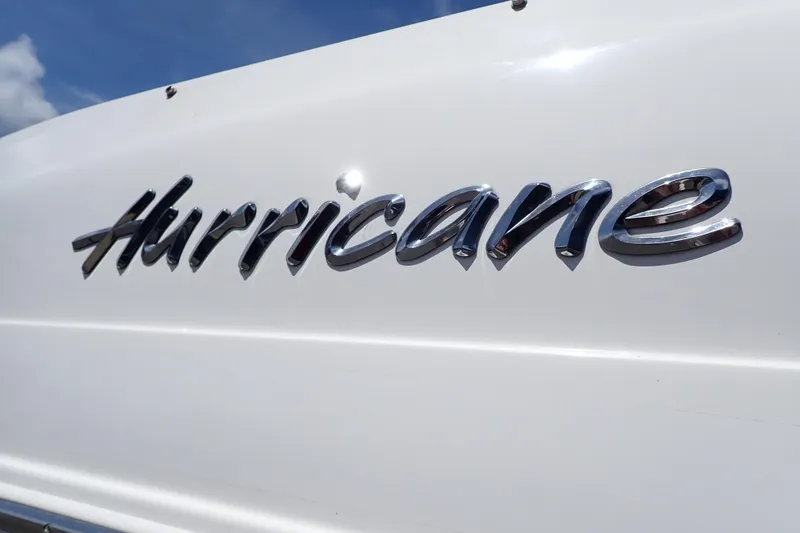 Slide: The Image of Chrome "Hurricane" logo on 2021 SunDeck Sport 185 OB boat. - 72