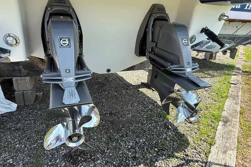 Slide: The Image of 2016 Chaparral 307 SSX boat with dual Volvo Penta outdrives on gravel. - 6