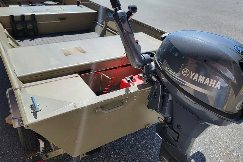 Slide: The Image of 2015 Tracker Topper 1542 LW Riveted Jon boat with Yamaha outboard motor. - 7