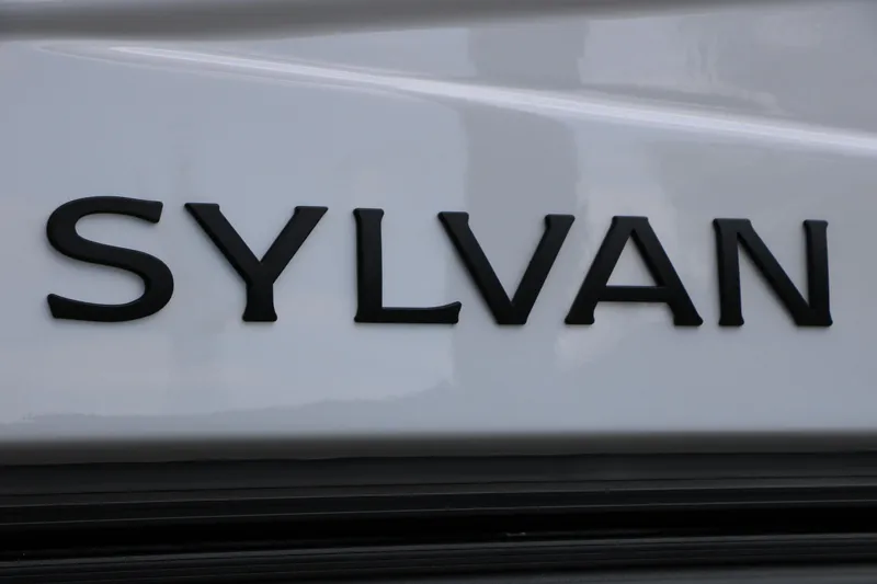 Slide: The Image of Sylvan logo on 2026 L3 DLZ Bar Platinum Edition Tri-Toon boat. - 12