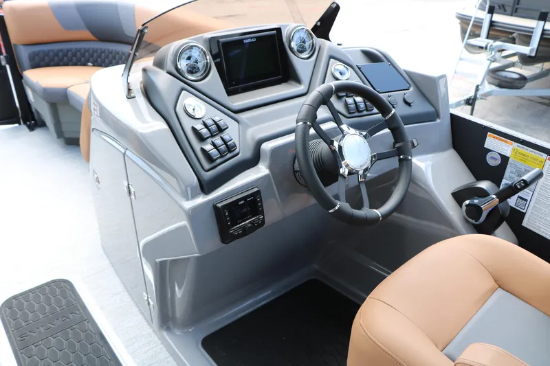 Slide: The Image of Interior view of 2026 Sylvan L3 DLZ Bar Platinum Edition Tri-Toon boat dashboard. - 23