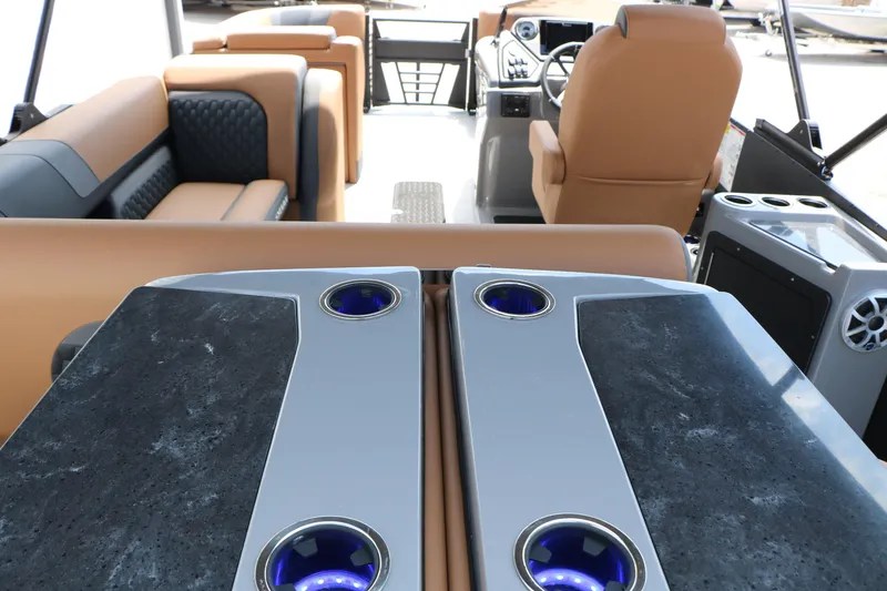 Slide: The Image of Luxurious interior of 2026 Sylvan L3 DLZ Bar Platinum Edition Tri-Toon with elegant seating. - 38
