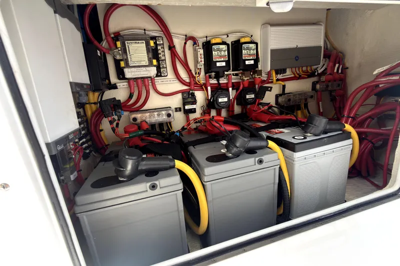 Slide: The Image of Electrical system of 2023 Bertram 28 CC boat with batteries and wiring. - 21
