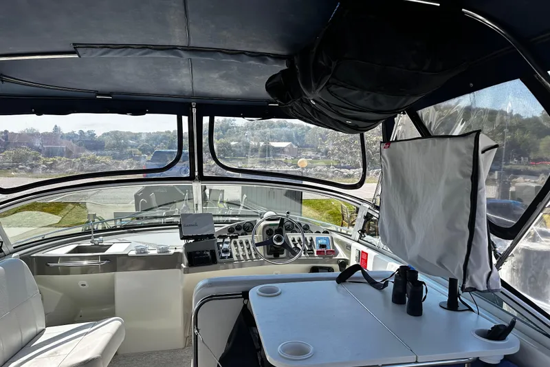 Slide: The Image of Interior view of 1998 Carver 350 Mariner yacht cockpit with navigation equipment. - 6