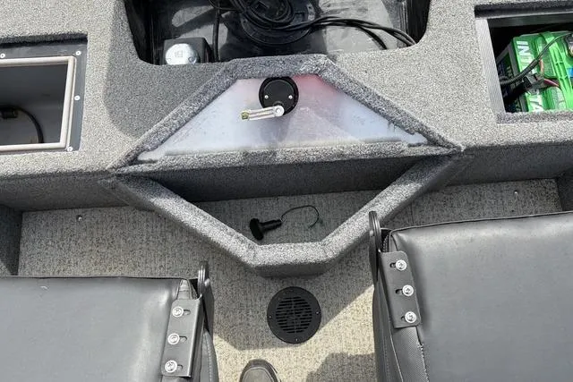 Slide: The Image of Interior of 2020 Tracker Pro Deep V-16 boat with seating and storage compartments. - 15