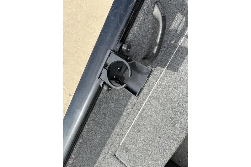 Slide: The Image of Boat accessory mount on 2020 Tracker Pro Deep V-16 console, featuring a black holder. - 17