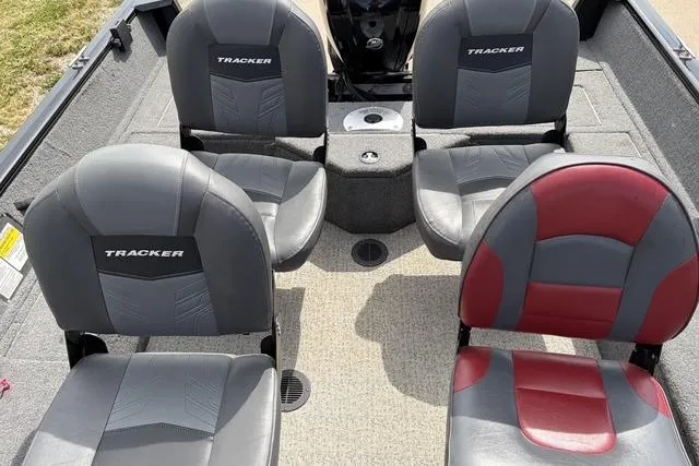 Slide: The Image of 2020 Tracker Pro Deep V-16 boat interior with four cushioned seats. - 6