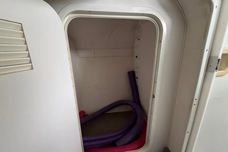 Slide: The Image of Interior cabin of a 2001 Baja 33 Outlaw boat with pool noodles. - 20