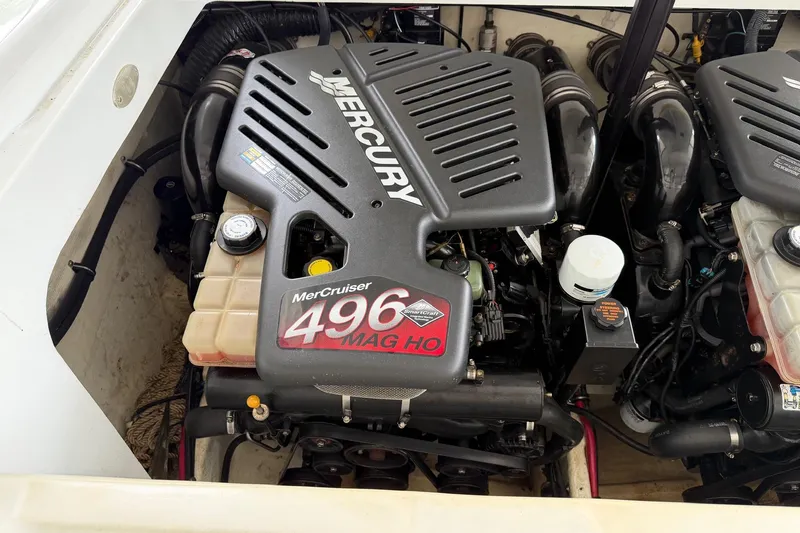 Slide: The Image of 2001 Baja 33 Outlaw boat engine, featuring a powerful MerCruiser 496 MAG HO. - 26