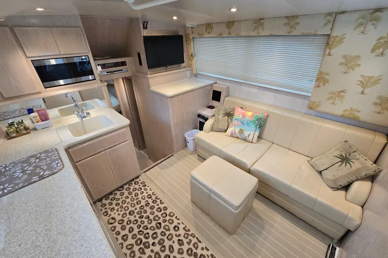 Slide: The Image of Interior of 2003 Henriques 35 Sportfisherman with modern kitchen and cozy seating area. - 16