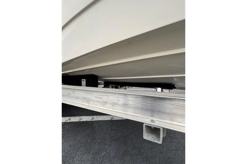 Slide: The Image of 2021 Pathfinder 2300 HPS boat hull on trailer, close-up view. - 9