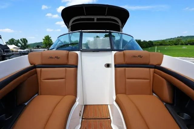 Slide: The Image of 2014 Sea Ray 270 SLX boat interior with tan leather seating and open deck. - 10