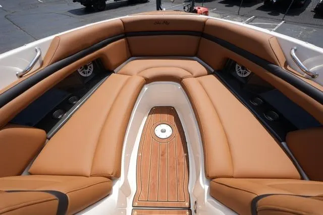 Slide: The Image of Luxurious 2014 Sea Ray 270 SLX boat interior with tan leather seating and wood accents. - 9
