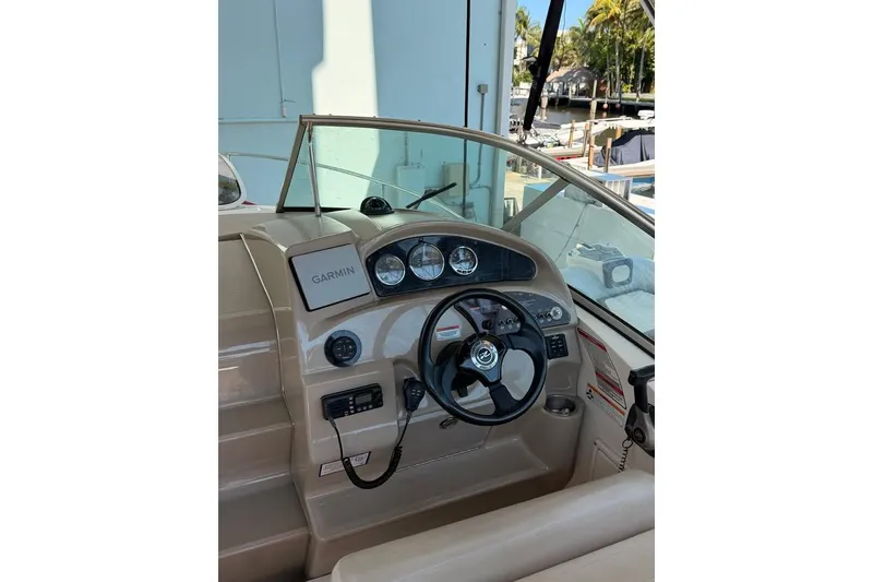 Slide: The Image of Steering console of a 2007 Sea Ray 240 Sundancer with Garmin navigation system. - 5