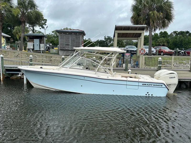 Slide: The Image of 2026 Grady-White Freedom 285 boat docked with Yamaha engine. - 0