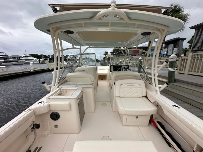 Slide: The Image of Grady-White Freedom 285 boat, 2026 model, docked at marina. - 10