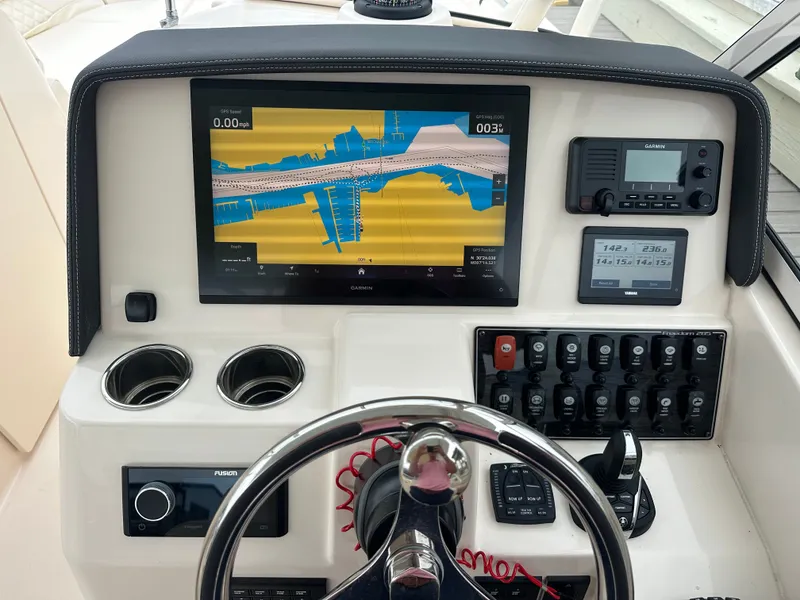 Slide: The Image of Grady-White Freedom 285 helm with navigation system, 2026 model. - 15
