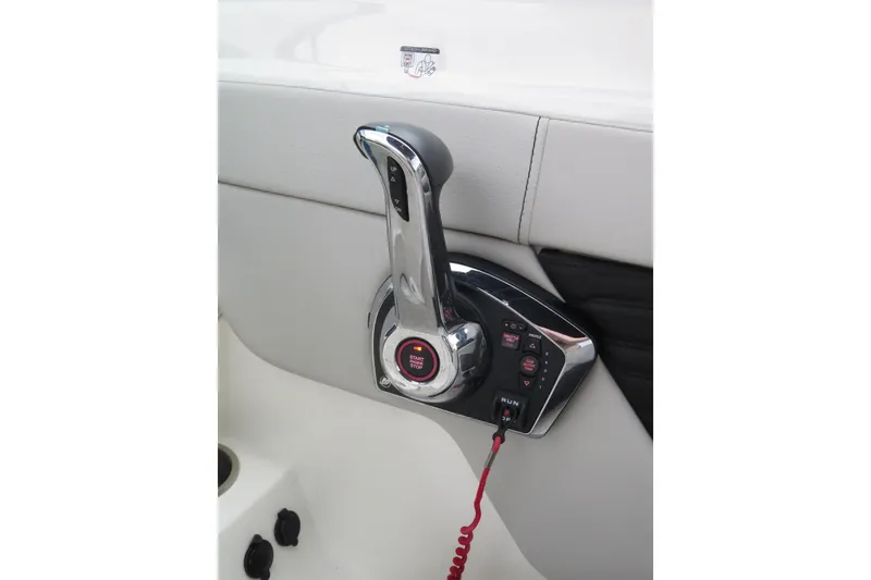 Slide: The Image of Throttle control of 2023 Sea Ray SPX 210 Outboard boat, featuring sleek design and controls. - 12