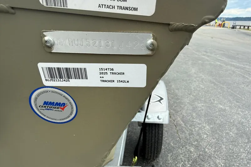 Slide: The Image of 2025 Tracker Grizzly 1542 boat with NMMA certification label and serial number. - 3