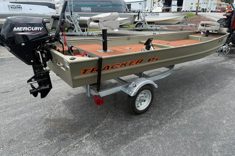 Slide: The Image of 2025 Tracker Grizzly 1542 boat with Mercury engine on trailer. - 4