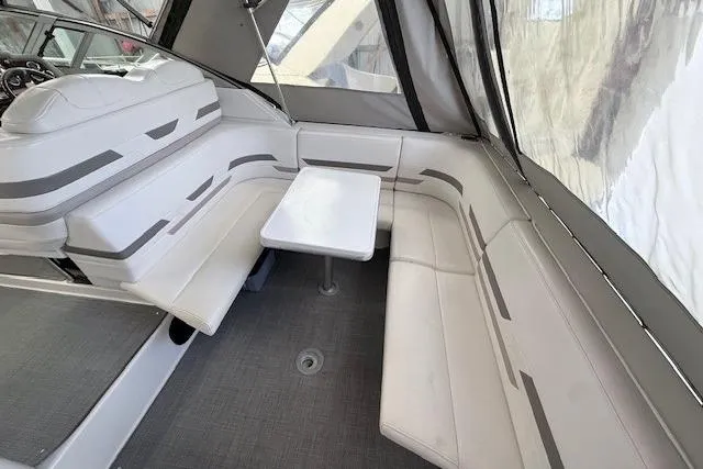 Slide: The Image of 2003 Formula 31 Performance Cruiser interior with white seating and table. - 10