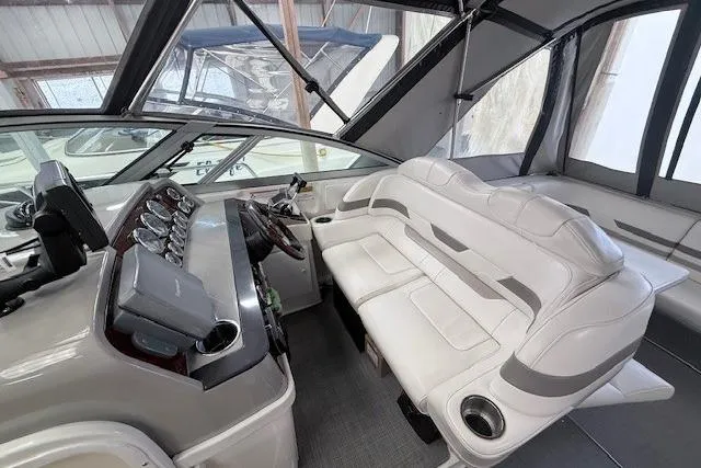 Slide: The Image of 2003 Formula 31 Performance Cruiser interior with sleek dashboard and comfortable seating. - 11