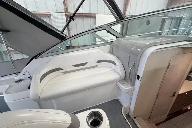 Slide: The Image of 2003 Formula 31 Performance Cruiser interior with white seating and modern design. - 12