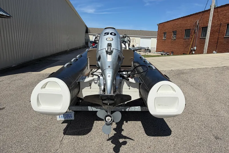 Slide: The Image of 2022 Brig Falcon 420 inflatable boat with outboard motor on a trailer. - 14