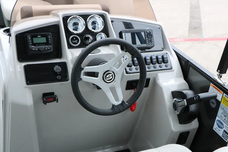 Slide: The Image of Steering console of 2026 Sylvan Mirage 822 LZ with gauges and controls. - 27