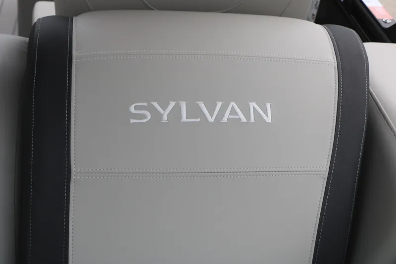 Slide: The Image of Sylvan Mirage 822 LZ 2026 boat seat with logo, featuring sleek design and stitching. - 33