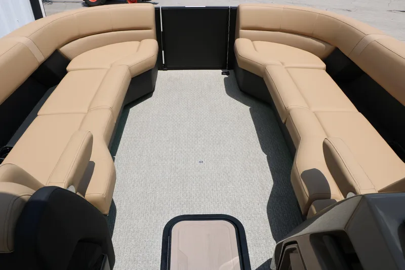 Slide: The Image of Luxurious seating on 2026 Evotti 725 CS Arch Tri-Toon boat, featuring beige upholstery. - 29