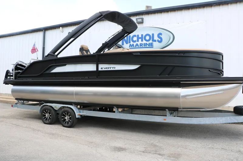 Slide: The Image of 2026 Evotti 725 CS Arch Tri-Toon boat on trailer at Nichols Marine dealership. - 3
