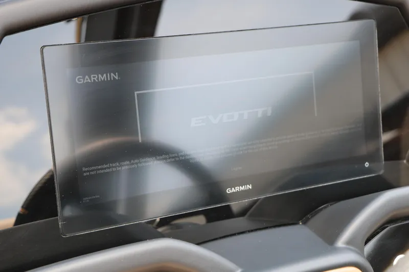 Slide: The Image of Garmin display on 2026 Evotti 725 CS Arch Tri-Toon dashboard. - 31