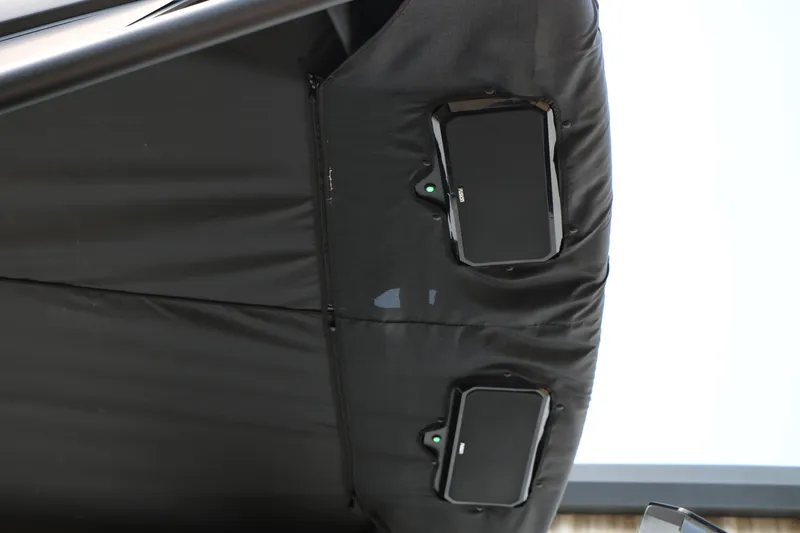 Slide: The Image of 2026 Evotti 725 CS Arch Tri-Toon with integrated speakers on black canopy. - 53