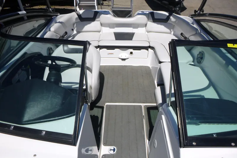 Slide: The Image of 2014 Yamaha Boats AR192 interior with seating and steering wheel, showcasing sleek design. - 6