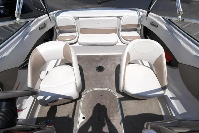 Slide: The Image of 2006 Four Winns 183 Horizon Fish & Ski boat interior with seating arrangement. - 10