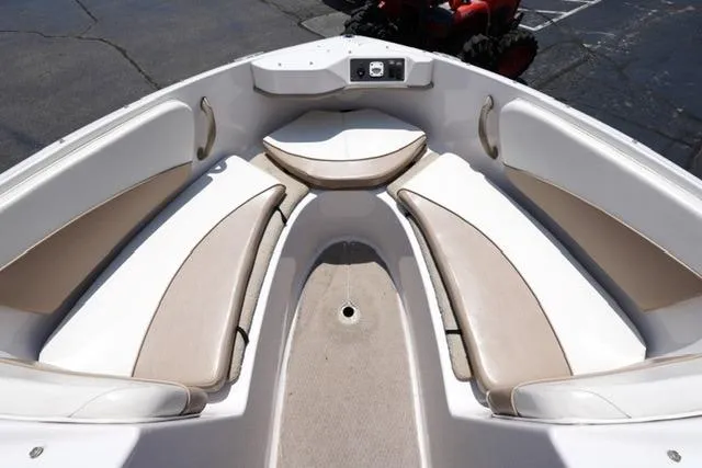 Slide: The Image of 2006 Four Winns 183 Horizon Fish & Ski boat interior with beige seating. - 8