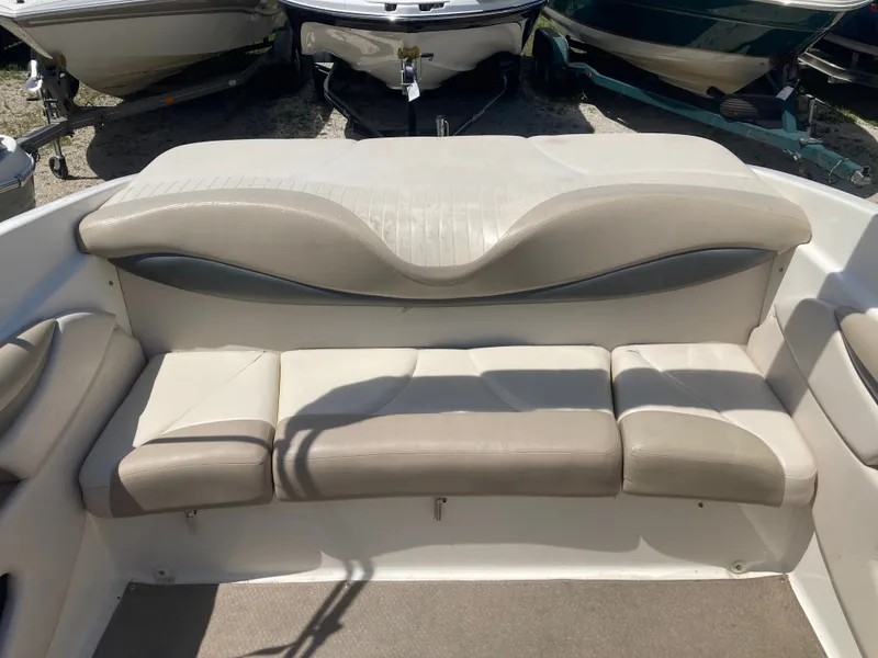 Slide: The Image of Interior of a 2006 Glastron GX 205 boat with beige seating. - 15
