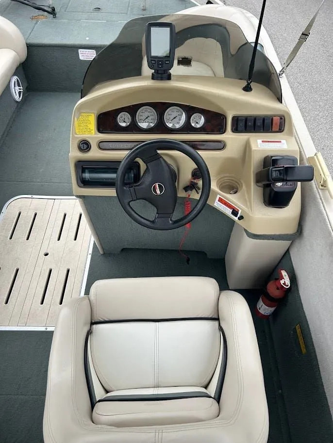 Slide: The Image of Interior view of a 2001 Sun Tracker Party Deck boat. - 7