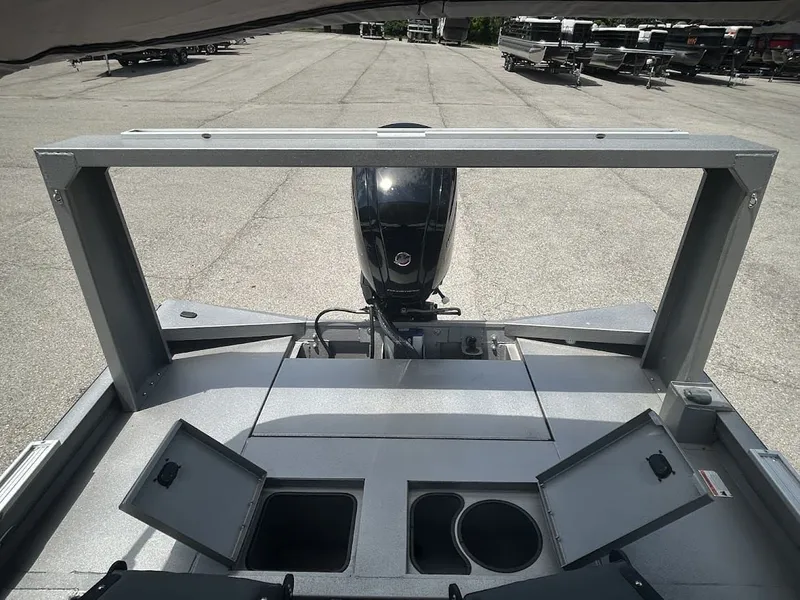 Slide: The Image of Lowe Outlet 20 boat 2025 with motor and storage compartments. - 14