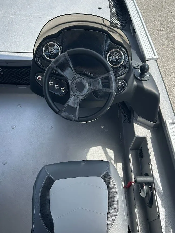 Slide: The Image of Steering console of Lowe Outlet 20 boat, model 2025. - 7