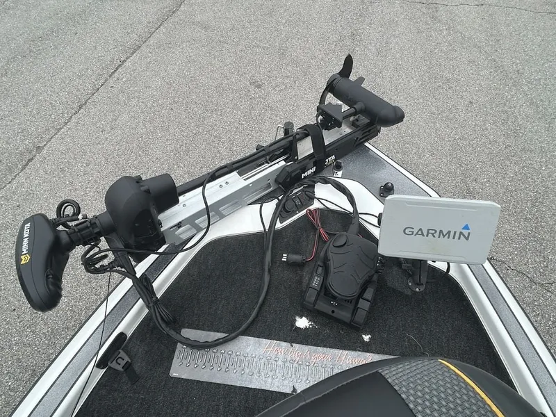 Slide: The Image of 1997 Champion 191 DC boat with Minn Kota and Garmin equipment. - 10