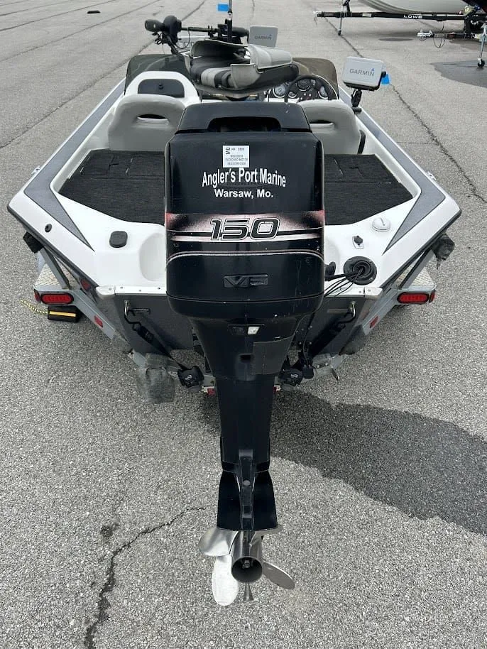 Slide: The Image of 1997 Champion 191 DC boat with outboard motor, Angler's Port Marine. - 3