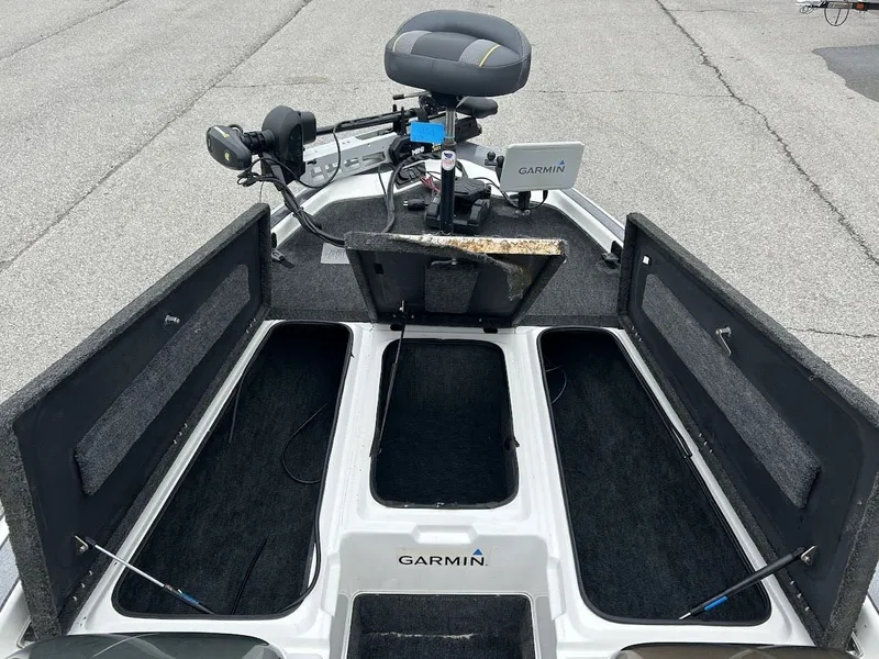 Slide: The Image of Interior view of a 1997 Champion 191 DC boat with Garmin equipment. - 9