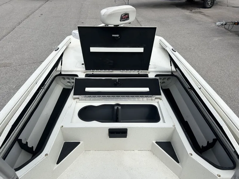 Slide: The Image of Interior view of a 2020 Ranger RB200 boat with storage compartments. - 11